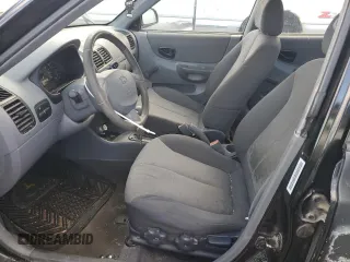 2003 Hyundai Accent GL with VIN KMHCG45C43U429167, listed as a Copart auction lot 79658124 with 80,926 mi miles and Clean Title. Bid and sale history available at carsss.com. Image 7.