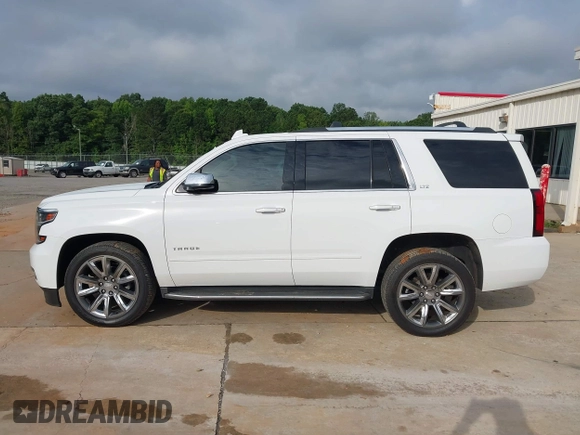 2016 Chevrolet Tahoe LTZ with VIN 1GNSCCKC4GR172697, listed as a IAAI auction lot 42490744 with 125,967 mi miles and . Bid and sale history available at DreamBid. Image 14.