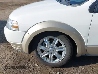 2008 Ford Taurus X Eddie Bauer z VIN 1FMDK07WX8GA15996, wystawiony jako IAAI lot #42221226 z przebiegiem 137 102 mil mil oraz . Historia ofert i sprzedaży dostępna na DreamBid. Obrazek 6.