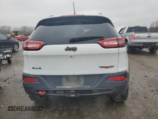2015 Jeep Cherokee Trailhawk z VIN 1C4PJMBS9FW698857, wystawiony jako Copart lot #86572504 z przebiegiem 143 919 mil mil oraz Czysty tytuł • Clean title. Historia ofert i sprzedaży dostępna na DreamBid. Obrazek 6.