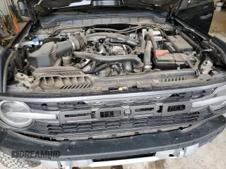 2023 Ford Bronco Raptor with VIN 1FMEE5JR7PLB23414, listed as a Copart auction lot 54733335 with 11,967 mi miles and Salvage title. Bid and sale history available at DreamBid. Image 12.