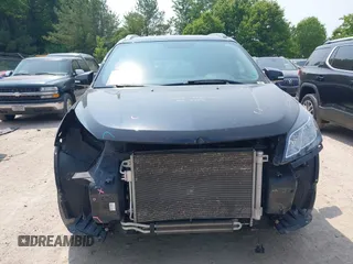2015 Chevrolet Traverse LT with VIN 1GNKVGKD7FJ131729, listed as a IAAI auction lot 42387016 with 134,179 mi miles and . Bid and sale history available at DreamBid. Image 13.