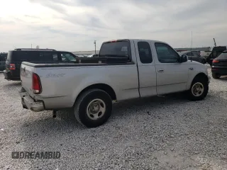 2002 Ford F-150 XL with VIN 1FTRX17282NA63790, listed as a Copart auction lot 42057394 with 158,054 mi miles and Salvage Title. Bid and sale history available at carsss.com. Image 3.