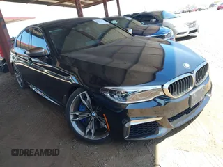 2019 BMW 5 Series M550i xDrive with VIN WBAJB9C52KB465071, listed as a IAAI auction lot 42107997 with 60,874 mi miles and . Bid and sale history available at DreamBid. Image 1.