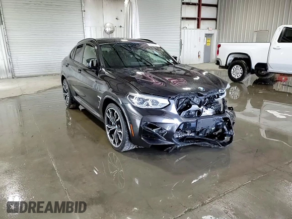 2020 BMW X4 M Competition z VIN 5YMUJ0C05L9B44115, wystawiony jako Copart lot #55556755 z przebiegiem Nie podano mil oraz Szkody całkowita. Historia ofert i sprzedaży dostępna na DreamBid. Obrazek 14.