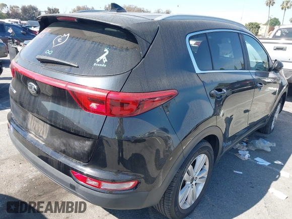 2017 Kia Sportage LX with VIN KNDPM3AC8H7049446, listed as a IAAI auction lot 42004562 with 79,055 mi miles and . Bid and sale history available at DreamBid. Image 4.