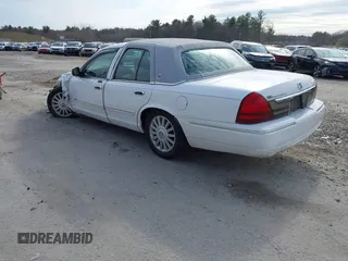 2010 Mercury Grand Marquis LS z VIN 2MEBM7FV7AX611959, wystawiony jako IAAI lot #41980176 z przebiegiem 112 885 mil mil oraz . Historia ofert i sprzedaży dostępna na DreamBid. Obrazek 3.