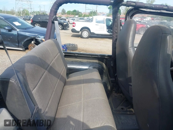 1999 Jeep Wrangler SE with VIN 1J4FY29P3XP469786, listed as a IAAI auction lot 42131018 with 130,918 mi miles and . Bid and sale history available at DreamBid. Image 8.