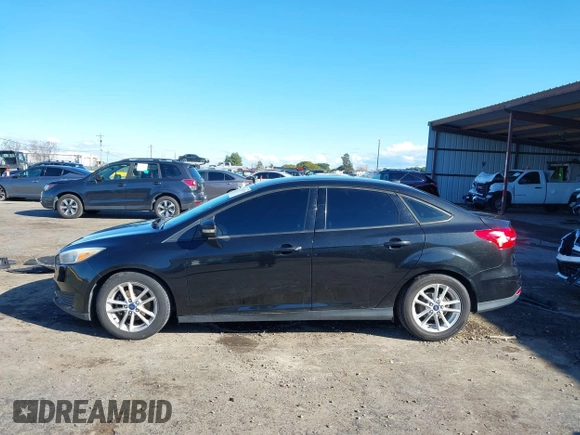 2015 Ford Focus SE with VIN 1FADP3F21FL262033, listed as a IAAI auction lot 41521714 with 101,890 mi miles. Bid and sale history available at carsss.com. Image 14.