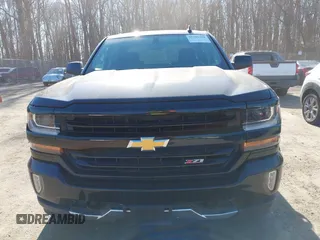 2018 Chevrolet Silverado 1500 LT with VIN 1GCUKREC3JF119906, listed as a IAAI auction lot 41765398 with 122,472 mi miles and . Bid and sale history available at DreamBid. Image 12.