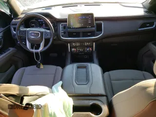 2021 GMC Yukon SLE with VIN 1GKS1AKD6MR200592, listed as a Copart auction lot 74764814 with 61,904 mi miles and Salvage Title. Bid and sale history available at carsss.com. Image 8.