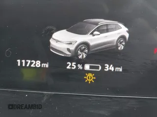 2023 Volkswagen ID.4 S z VIN 1V25MPE87PC018469, wystawiony jako IAAI lot #41243255 z przebiegiem 11 728 mil mil oraz . Historia ofert i sprzedaży dostępna na DreamBid. Obrazek 7.