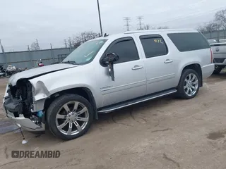 2014 GMC Yukon XL Denali with VIN 1GKS2MEF1ER246201, listed as a IAAI auction lot 41454172 with 135,394 mi miles. Bid and sale history available at carsss.com. Image 2.