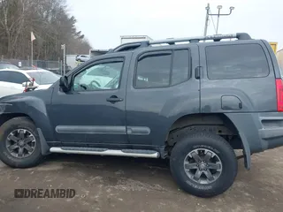 2014 Nissan Xterra X with VIN 5N1AN0NW5EN810488, listed as a IAAI auction lot 41705791 with 127,936 mi miles and . Bid and sale history available at DreamBid. Image 14.