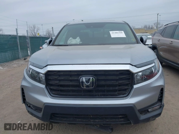 2021 Honda Ridgeline RTL-E with VIN 5FPYK3F79MB010091, listed as a IAAI auction lot 41386318 with 37,996 mi miles and . Bid and sale history available at DreamBid. Image 12.