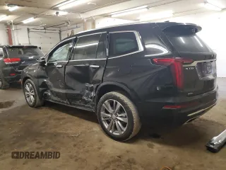 2023 Cadillac XT6 AWD Premium Luxury z VIN 1GYKPDRS0PZ209335, wystawiony jako Copart lot #48555685 z przebiegiem 30 375 mil mil oraz Szkoda całkowita • Salvage title. Historia ofert i sprzedaży dostępna na DreamBid. Obrazek 2.