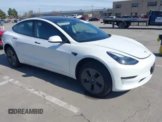 2023 Tesla Model 3 z VIN 5YJ3E1EAXPF646809, wystawiony jako IAAI lot #41848687 z przebiegiem 32 067 mil mil oraz . Historia ofert i sprzedaży dostępna na DreamBid. Obrazek 1.