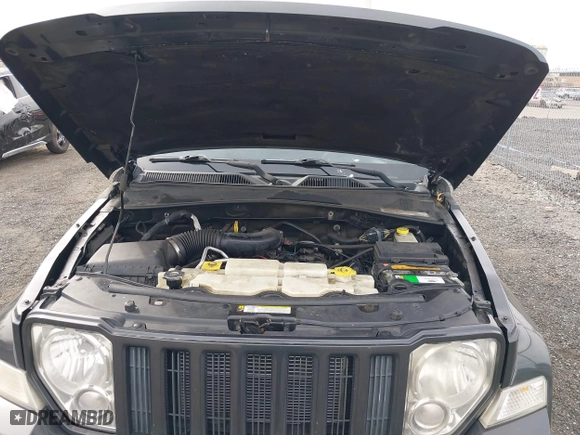 2011 Jeep Liberty Sport with VIN 1J4PN2GK2BW581496, listed as a IAAI auction lot 42080245 with 171,626 mi miles. Bid and sale history available at carsss.com. Image 10.