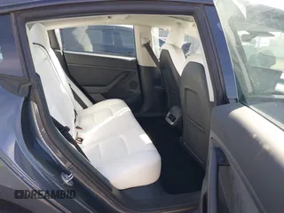 2023 Tesla Model 3 Performance with VIN 5YJ3E1EC4PF705449, listed as a IAAI auction lot 41587026 with 30,292 mi miles. Bid and sale history available at carsss.com. Image 8.