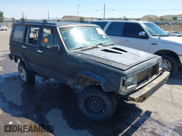 1995 Jeep Cherokee Sport with VIN 1J4FJ68S5SL541413, listed as a IAAI auction lot 42722408 with 335,432 mi miles and . Bid and sale history available at DreamBid. Image 1.