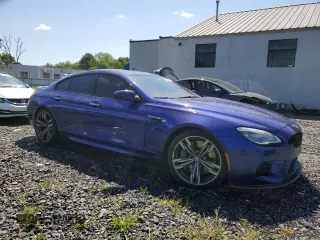 2016 BMW M6 z VIN WBS6E9C56GGF92508, wystawiony jako Copart lot #66958344 z przebiegiem Nie podano mil oraz Szkoda całkowita • Salvage title. Historia ofert i sprzedaży dostępna na DreamBid. Obrazek 4.