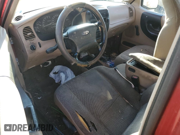 2001 Ford Ranger XL with VIN 1FTYR10C91TA26959, listed as a Copart auction lot 86453044 with 303,676 mi miles and Salvage title. Bid and sale history available at DreamBid. Image 8.