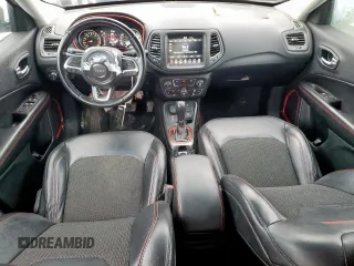 2020 Jeep Compass Trailhawk with VIN 3C4NJDDB3LT189398, listed as a Copart auction lot 59376995 with 75,674 mi miles and Salvage title. Bid and sale history available at DreamBid. Image 8.