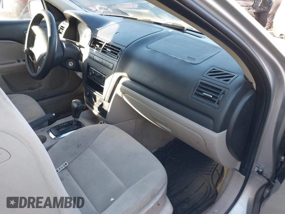 2008 Ford Fusion S with VIN 3FAHP06ZX8R181470, listed as a IAAI auction lot 41573211 with 249,337 mi miles. Bid and sale history available at carsss.com. Image 5.