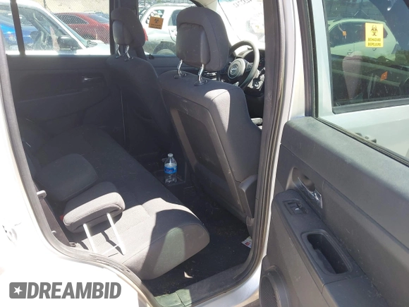 2012 Jeep Liberty Sport Latitude z VIN 1C4PJMAK2CW158599, wystawiony jako IAAI lot #42327424 z przebiegiem 118 960 mil mil oraz . Historia ofert i sprzedaży dostępna na DreamBid. Obrazek 8.