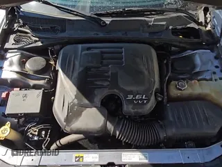 2015 Dodge Challenger SXT с VIN 2C3CDZAG0FH718741, выставлен на аукционе Copart как лот 70857735 с пробегом 145 522 миль миль и Чистый • Clean title. История ставок и продаж доступна на DreamBid. Изображение 13.