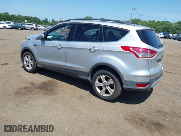 2014 Ford Escape SE with VIN 1FMCU9GX8EUA88526, listed as a IAAI auction lot 42578612 with 22,623 mi miles and . Bid and sale history available at DreamBid. Image 3.