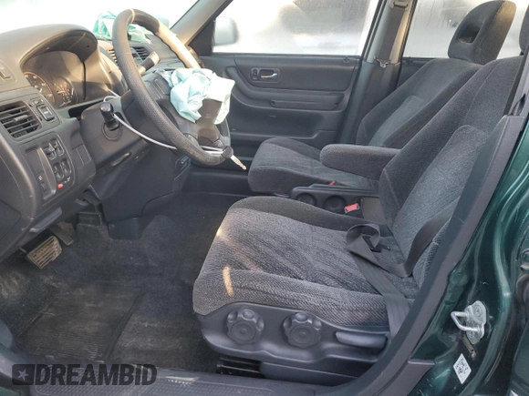 2000 Honda CR-V EX with VIN JHLRD1863YC017768, listed as a Copart auction lot 76383504 with 223,753 mi miles and Salvage Title. Bid and sale history available at carsss.com. Image 7.