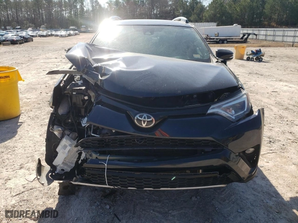 2018 Toyota RAV4 SE with VIN 2T3JFREV1JW780907, listed as a Copart auction lot 48913655 with 119,402 mi miles and Salvage Title. Bid and sale history available at carsss.com. Image 5.