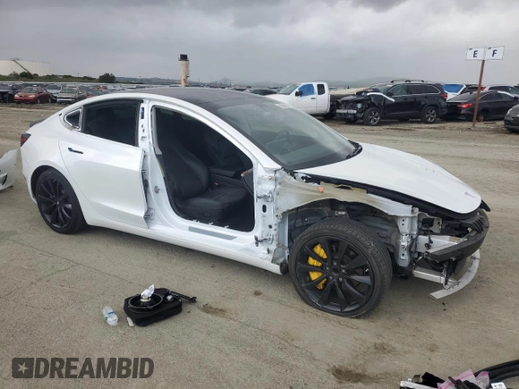 2019 Tesla Model 3 Mid Range with VIN 5YJ3E1EA8KF412886, listed as a Copart auction lot 50824565 with 54,803 mi miles and Salvage Title. Bid and sale history available at carsss.com. Image 4.