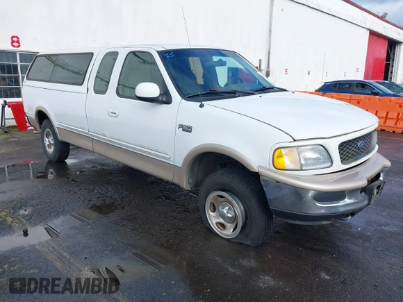 1997 Ford F-150 XL with VIN 1FTEX18L6VKC06859, listed as a IAAI auction lot 41592418 with 274,814 mi miles. Bid and sale history available at carsss.com. Image 1.