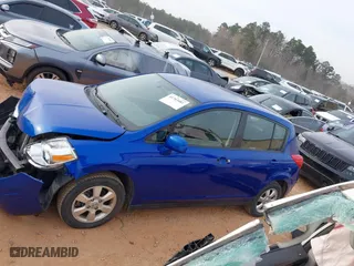 2012 Nissan Versa S with VIN 3N1BC1CP0CK239739, listed as a IAAI auction lot 41763481 with 146,605 mi miles. Bid and sale history available at carsss.com. Image 14.