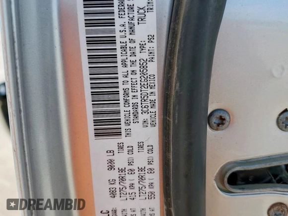 2014 Ram 2500 SLT with VIN 3C6TR5DT2EG205852, listed as a Copart auction lot 59514745 with 130,510 mi miles and Salvage title. Bid and sale history available at DreamBid. Image 12.