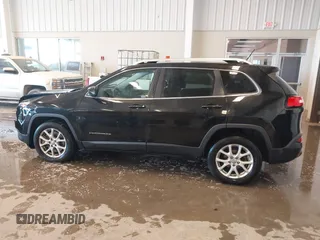 2015 Jeep Cherokee Latitude with VIN 1C4PJLCB9FW536767, listed as a IAAI auction lot 41380122 with 192,535 mi miles. Bid and sale history available at carsss.com. Image 14.