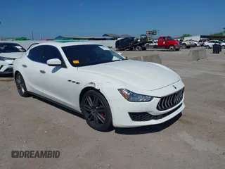2018 Maserati Ghibli with VIN ZAM57XSA5J1271790, listed as a IAAI auction lot 42085940 with 91,322 mi miles and . Bid and sale history available at DreamBid. Image 1.