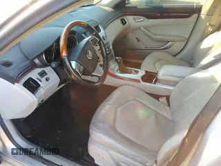 2009 Cadillac CTS AWD w/1SA with VIN 1G6DG577990113457, listed as a IAAI auction lot 38002705 with 101,298 mi miles. Bid and sale history available at carsss.com. Image 5.