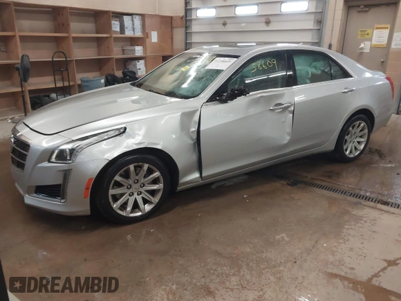 2014 Cadillac CTS Luxury AWD with VIN 1G6AX5S3XE0158960, listed as a IAAI auction lot 41258609 with 84,360 mi miles and . Bid and sale history available at DreamBid. Image 17.