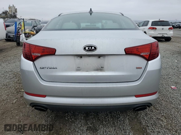 2012 Kia Optima LX z VIN 5XXGM4A73CG033597, wystawiony jako Copart lot #59585515 z przebiegiem 141 577 mil mil oraz Szkoda całkowita • Salvage title. Historia ofert i sprzedaży dostępna na DreamBid. Obrazek 6.