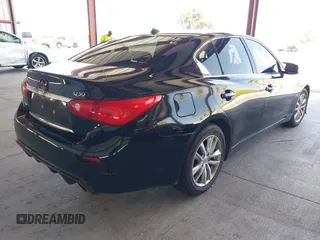 2015 Infiniti Q50 z VIN JN1BV7AR9FM400238, wystawiony jako IAAI lot #42497174 z przebiegiem 69 935 mil mil oraz . Historia ofert i sprzedaży dostępna na DreamBid. Obrazek 4.