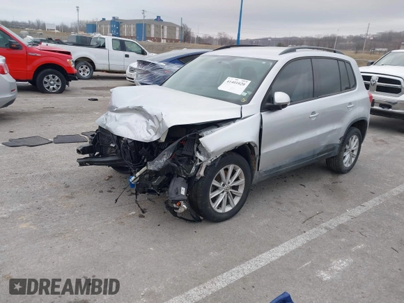2015 Volkswagen Tiguan SE with VIN WVGAV7AX5FW592216, listed as a IAAI auction lot 41401020 with 110,726 mi miles and . Bid and sale history available at DreamBid. Image 18.