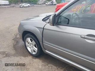 2007 Subaru Forester Special Sports XT z VIN JF1SG69637H740500, wystawiony jako IAAI lot #42231595 z przebiegiem 106 758 mil mil oraz . Historia ofert i sprzedaży dostępna na DreamBid. Obrazek 6.