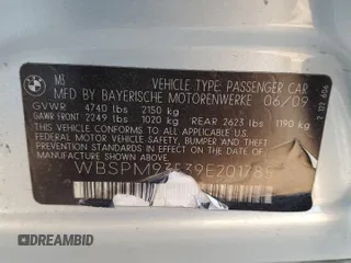 2009 BMW M3 with VIN WBSPM93539E201785, listed as a Copart auction lot 42153135 with 140,557 mi miles and Salvage title. Bid and sale history available at DreamBid. Image 12.