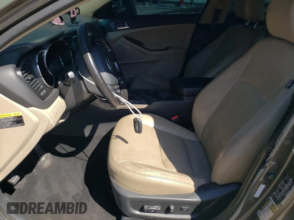 2013 Kia Optima EX с VIN 5XXGN4A77DG108218, выставлен на аукционе Copart как лот 57728815 с пробегом 162 475 миль миль и Списание • Salvage title. История ставок и продаж доступна на DreamBid. Изображение 7.