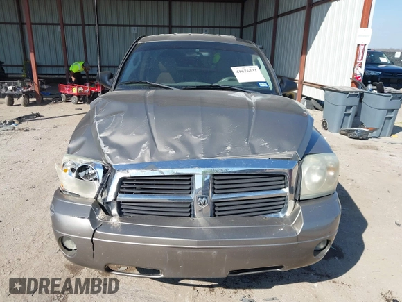 2006 Dodge Dakota SLT with VIN 1D7HE42K16S666071, listed as a IAAI auction lot 41676231 with 129,977 mi miles and . Bid and sale history available at carsss.com. Image 12.