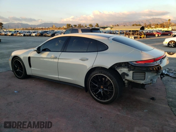 2021 Porsche Panamera с VIN WP0AJ2A73ML117455, выставлен на аукционе Copart как лот 76828823 с пробегом 54 543 миль миль и . История ставок и продаж доступна на DreamBid. Изображение 2.