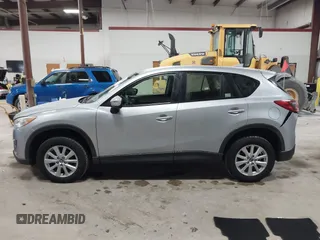 2016 Mazda CX-5 Sport with VIN JM3KE2BY2G0718434, listed as a IAAI auction lot 41961364 with 145,748 mi miles. Bid and sale history available at carsss.com. Image 14.